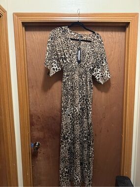 NWT ! Leopard Print swimsuit cover up, slits on both sides.
